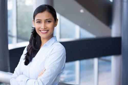 woman smiling after getting dental implants doreen
