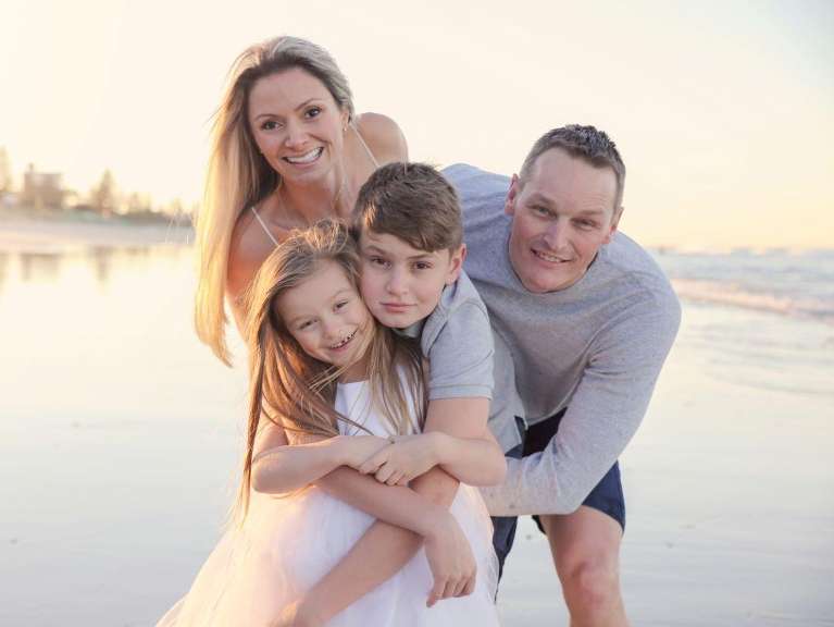 family on the beach in doreen vic